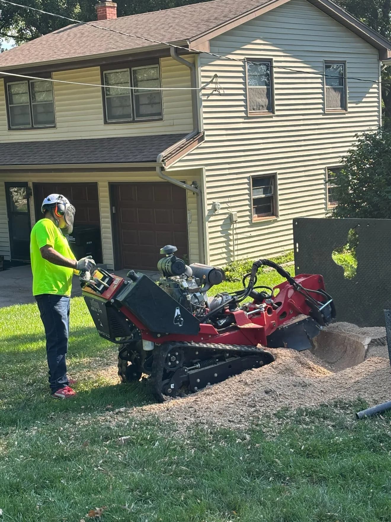 Stump grinding after a removal in La Vista