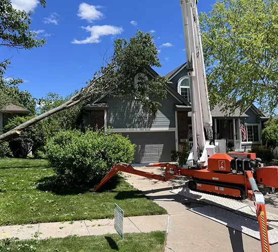 After storms the Eden Tree Pros crew prepares equipment for tree care service in Gretna, Nebraska